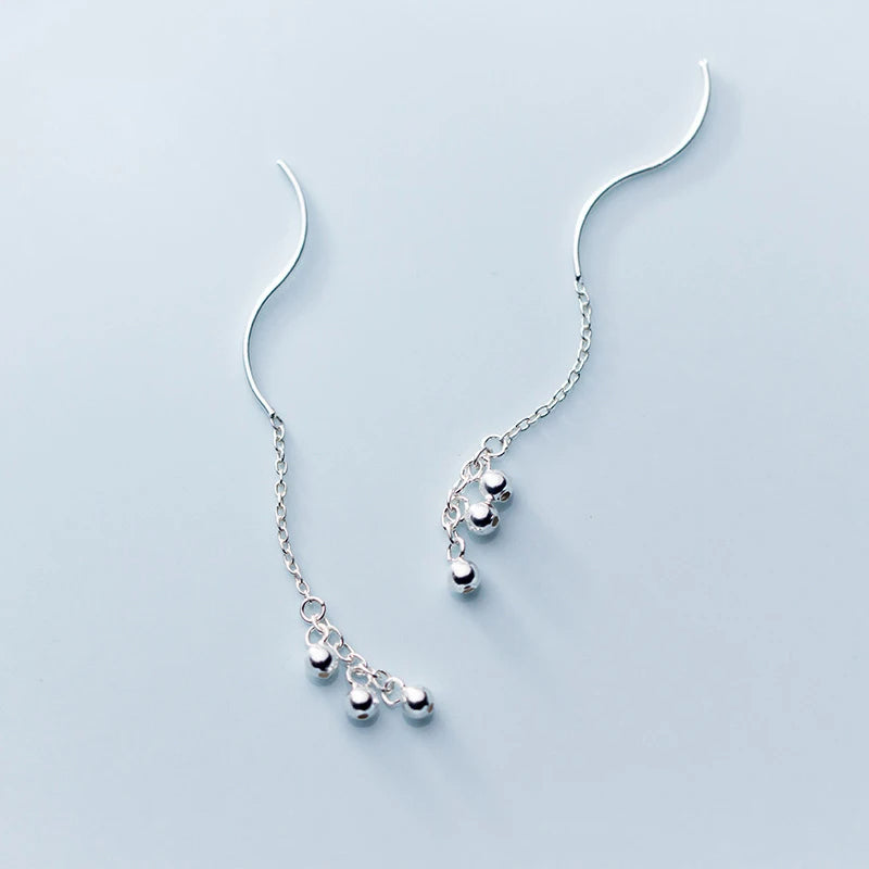 Elegant sterling silver earrings styled as earrings with silver accents