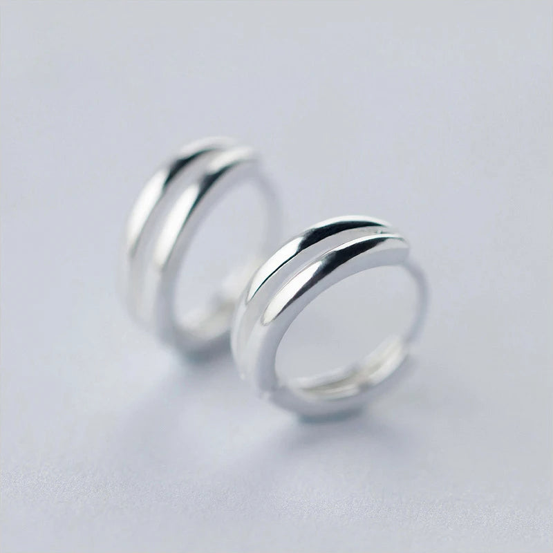 925 sterling silver hoop earrings for women in a polished silver hoop style