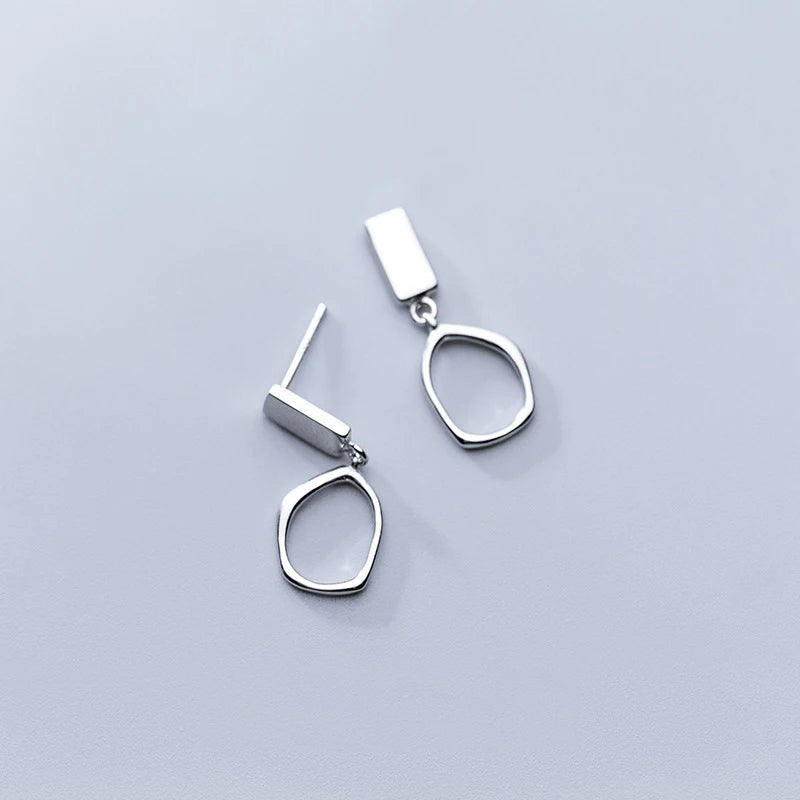 Lightweight dangle earrings pairing well with classic ear rings