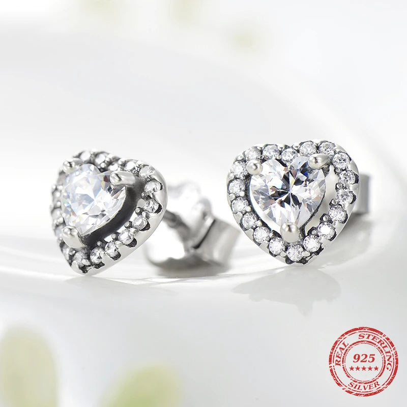 Heart earrings with a cz heart set on polished 925 sterling silver