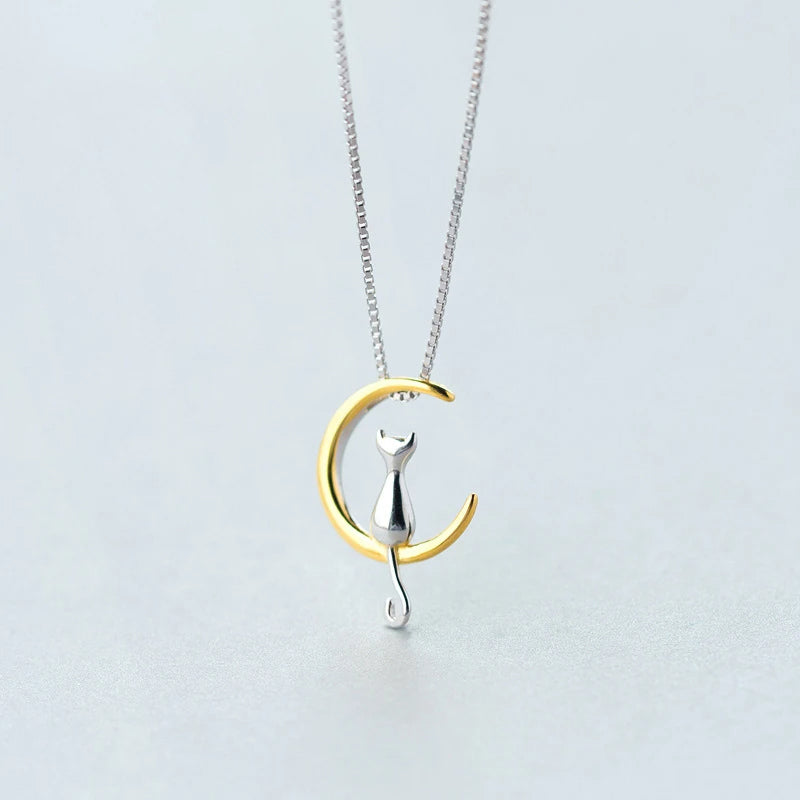 Model wearing earrings and gold paired with a subtle gold in necklace accent