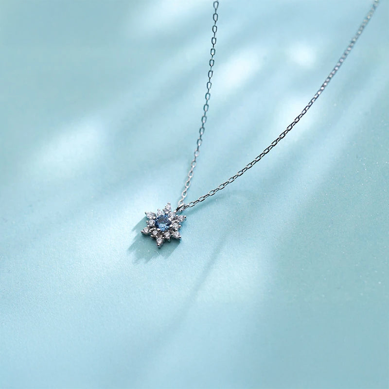 Pendant necklace with cz snoowflake charm on a silver chain