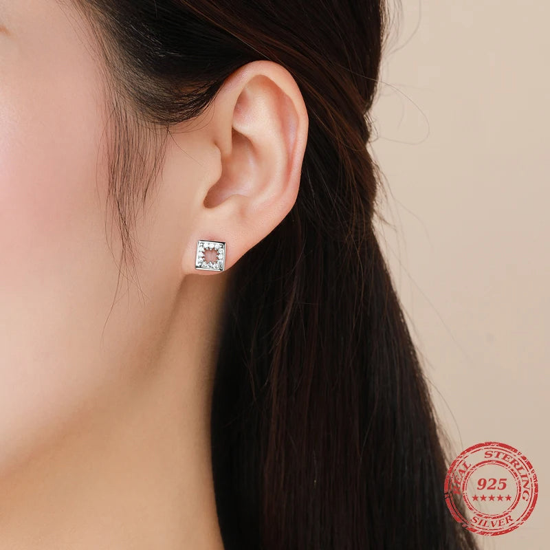 Silver stud earrings in 925 sterling silver showing a clean geometric look