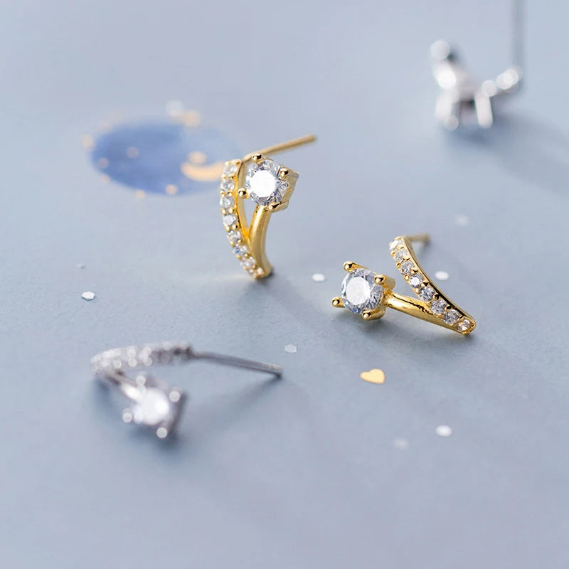 Cubic zirconia ear rings shown as sterling silver earrings with silver color shine