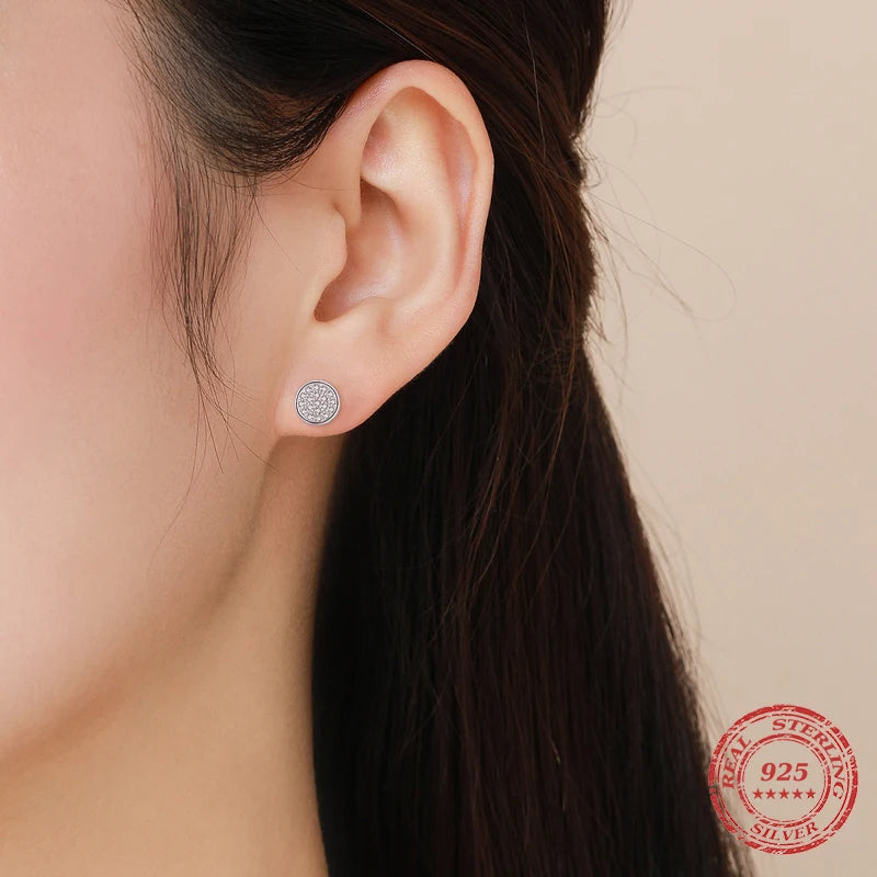 Sterling silver earrings shown as silver stud earrings for daily wear
