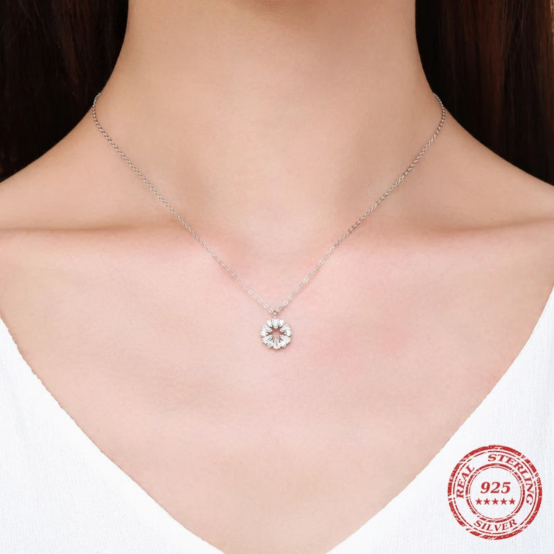 925 sterling silver snowflake necklace styled as a pendant necklace