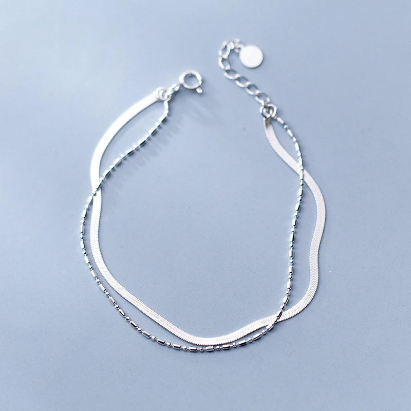 Close view of chain bracelet in bright sterling silver bracelet finish