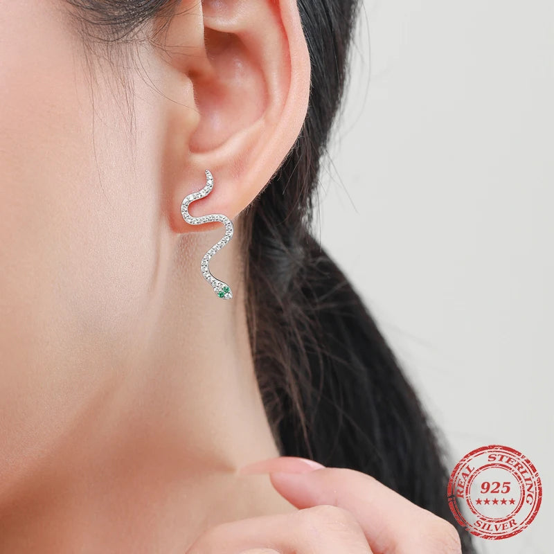 Silver bracelet and silver bangle arranged with sterling silver earrings set