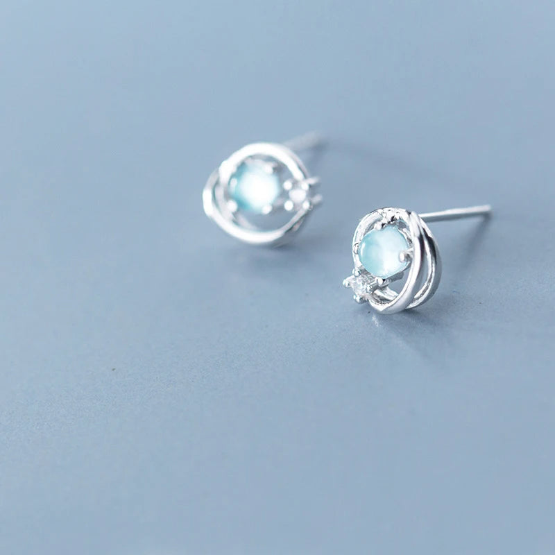 Stud earrings in polished sterling silver with opal jewelry shine