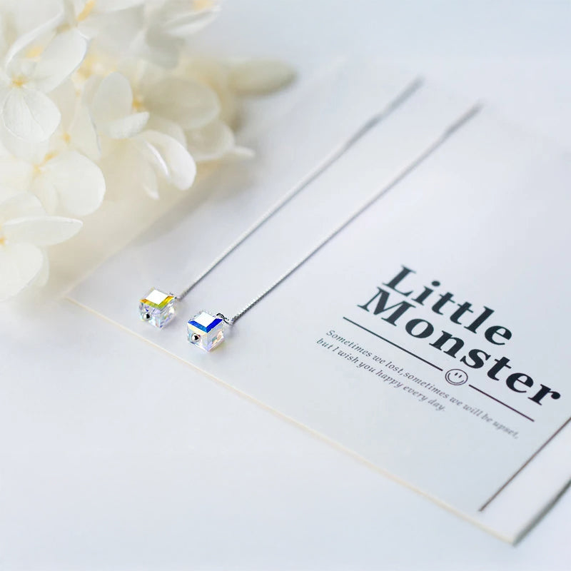 Colorful earrings with crystal accents on modern square earrings