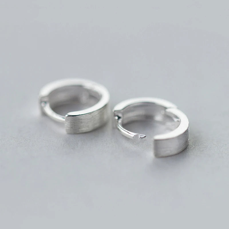 Silver hoop earrings with smooth sterling silver curve
