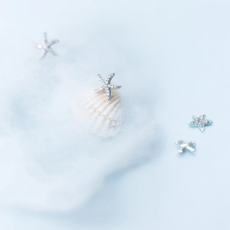 Women stud earrings in 925 sterling silver with cz accents