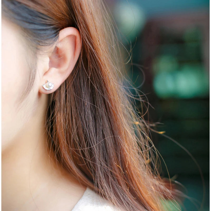 Minimal ear rings featuring Pearl Shell accents and freshwater pearl