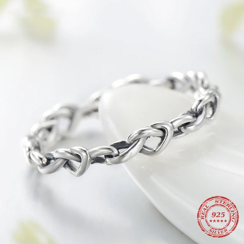 Stackable ring paired with another sterling silver ring for layered shine
