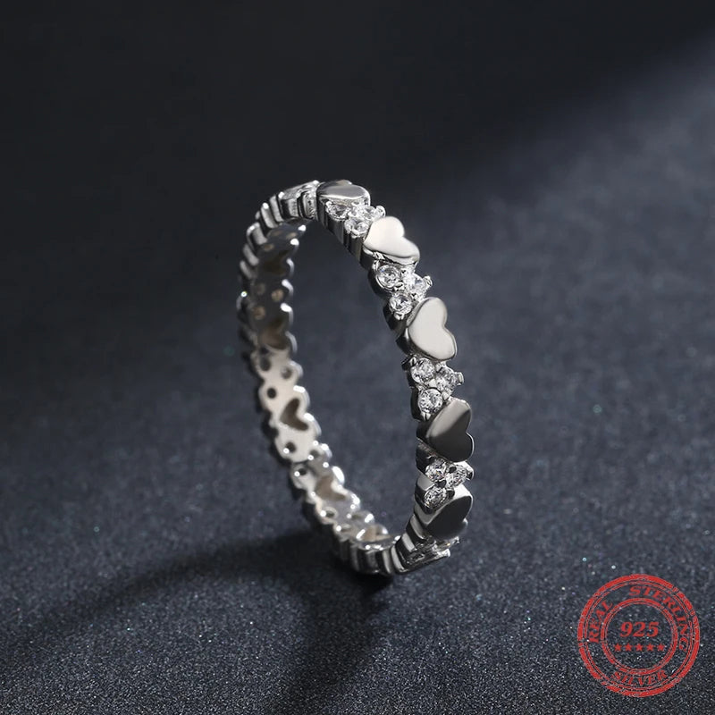 Close up of minimalist heart band stack in 925 silver