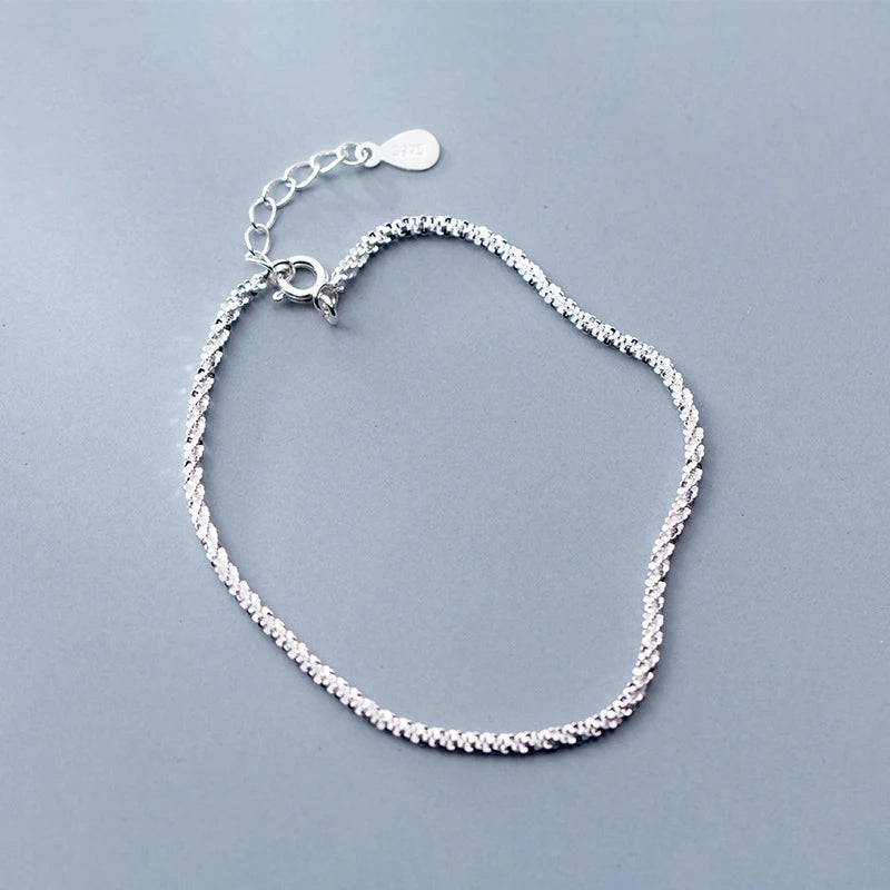 925 silver charm bracelet with refined, polished finish