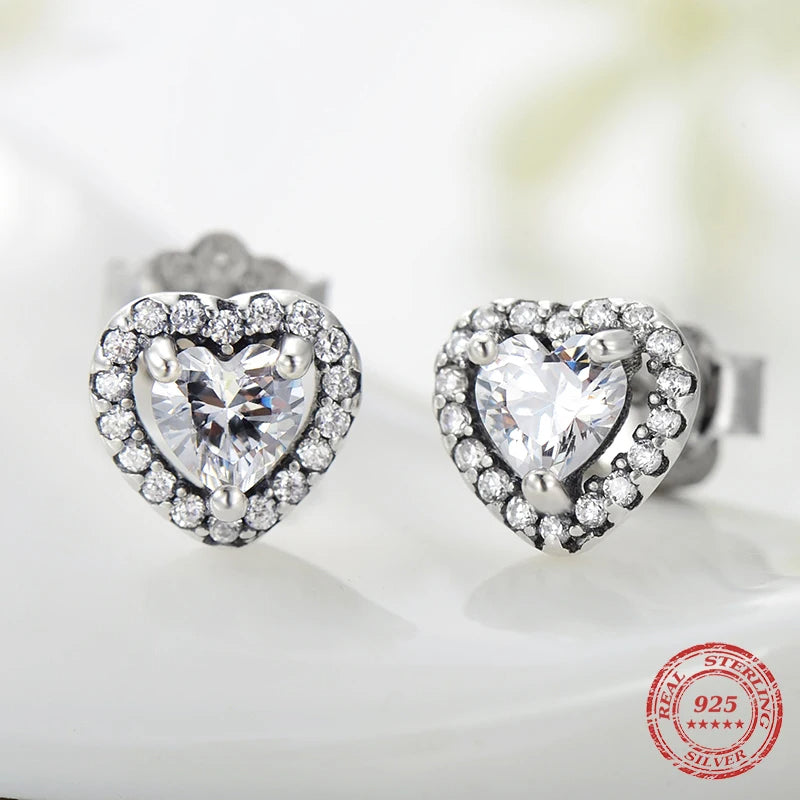 Elegant ear rings featuring 925 sterling silver and a cz heart