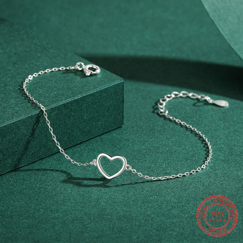 925 sterling silver heart bracelet paired with a polished sterling silver chain
