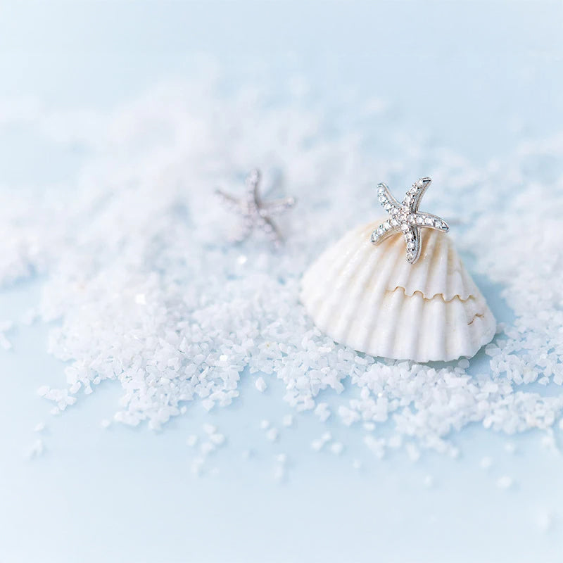 Silver stud earrings with starfish detail and subtle cz sparkle