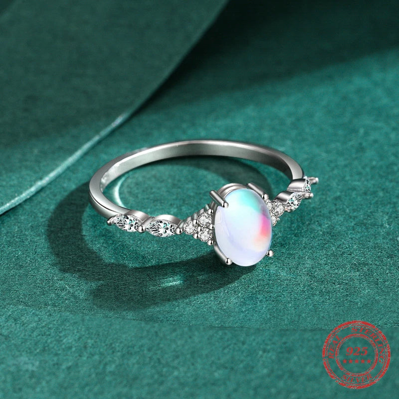 Silver jewelry set featuring moonstone ring and bracelet