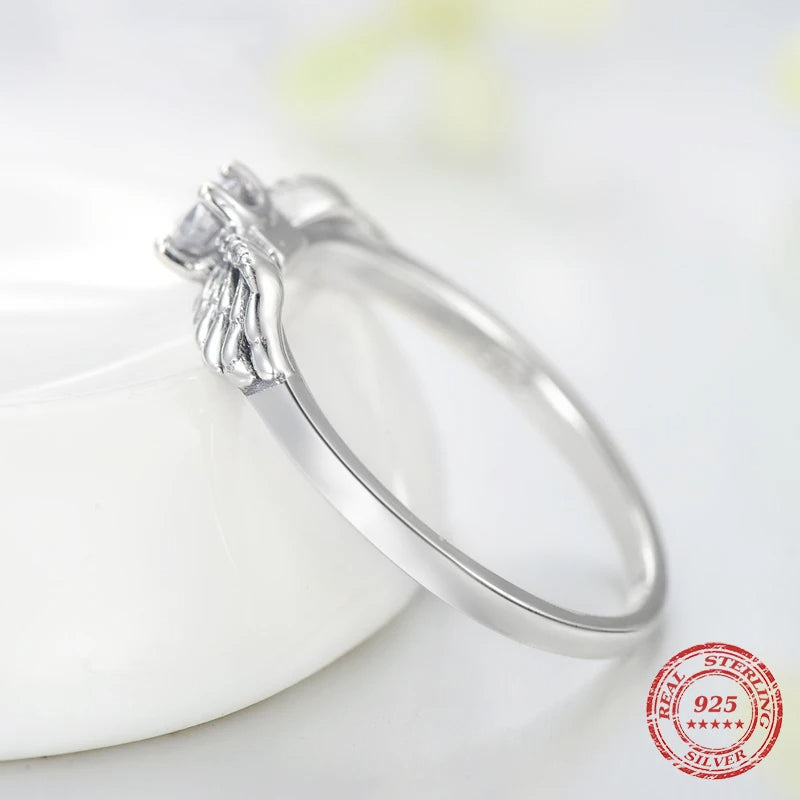 Close view of cubic zirconia on a smooth sterling silver band