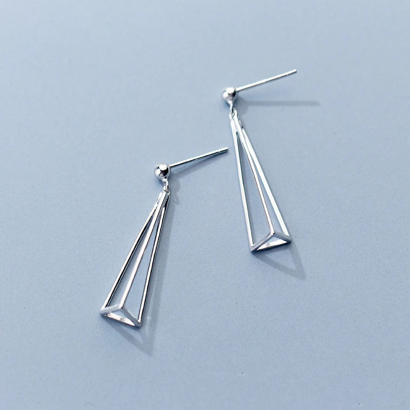 Elegant drop earrings in 925 silver shaped as a delicate 3D triangle