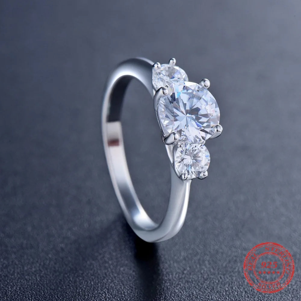 Women’s ring with three zircons in sterling silver band