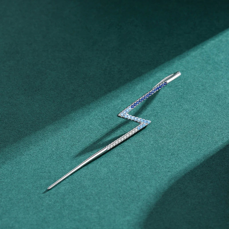 Minimal ear rings styled to match silver hoops effortlessly