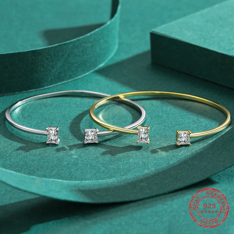 Classic sterling silver bracelet layered with a silver bangle