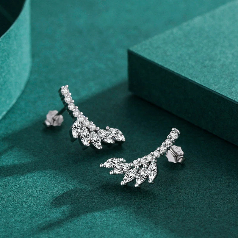 Ear rings styled as classic stud earrings with bright cz accents