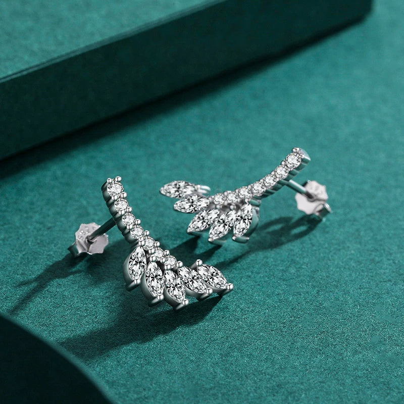 Sterling silver earrings showing a delicate tree leaves design