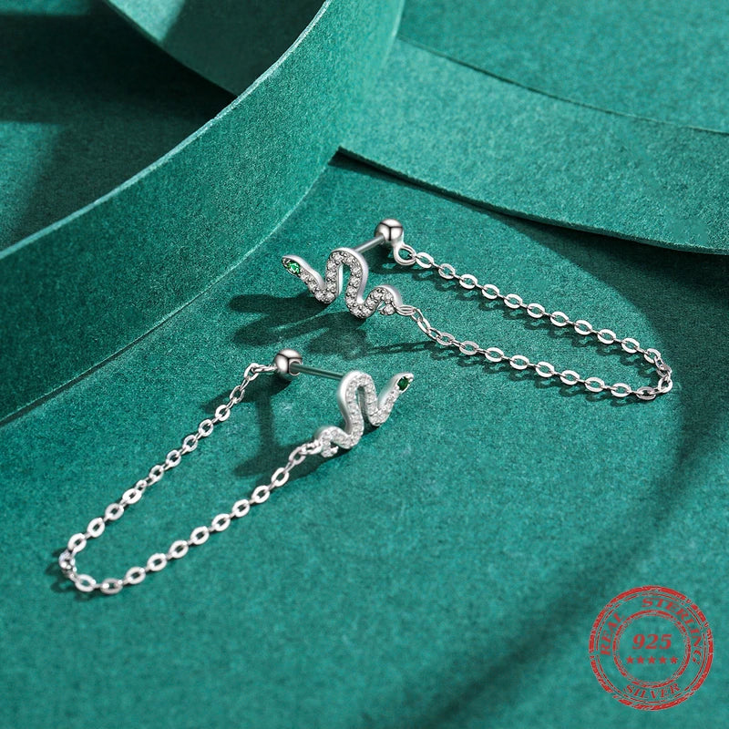 Tassel earrings movement with black crystal and snake charm