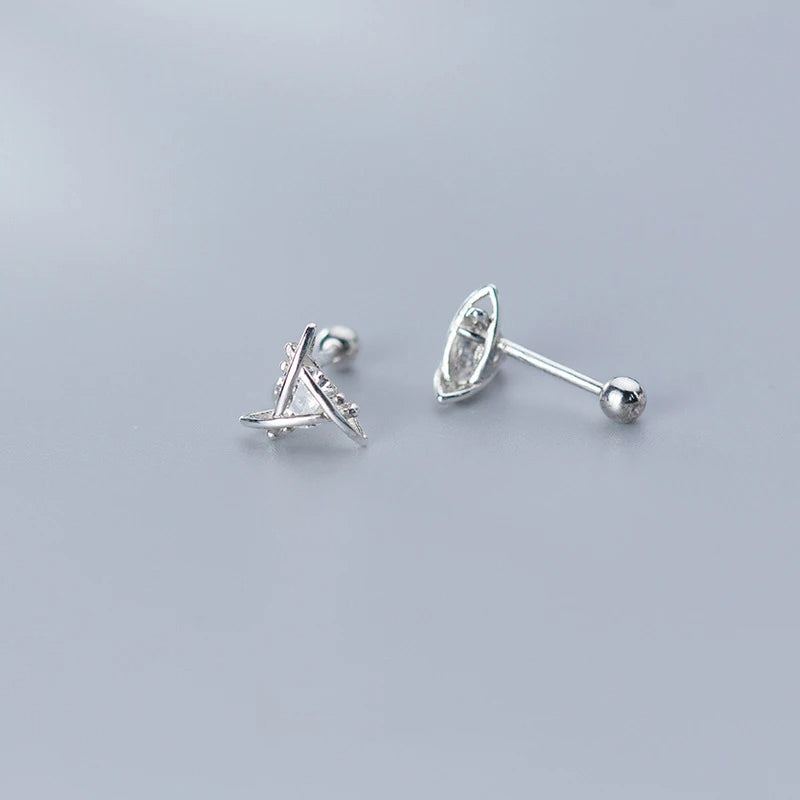 Silver stud earrings shown with polished finish and clean lines