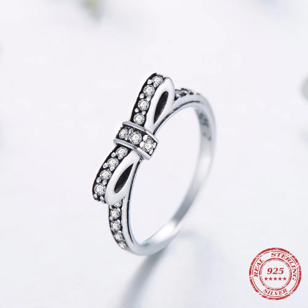 Close up 925 sterling silver band featuring cubic zirconia detail