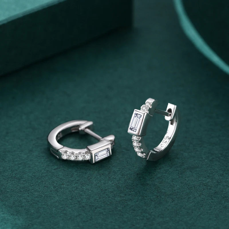 Silver hoop designed with clear zirconia sparkle and polished metal shine