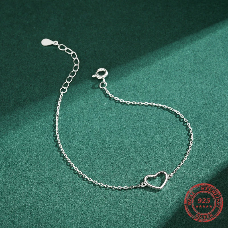 Bracelet charm accent set on a smooth bracelet chain in classic sterling silver