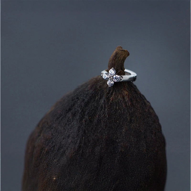 Silver hoop earrings with cubic zirconia flower in sterling silver