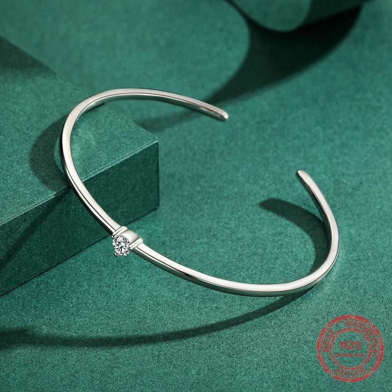 Silver bangle style in 925 silver with CZ accent