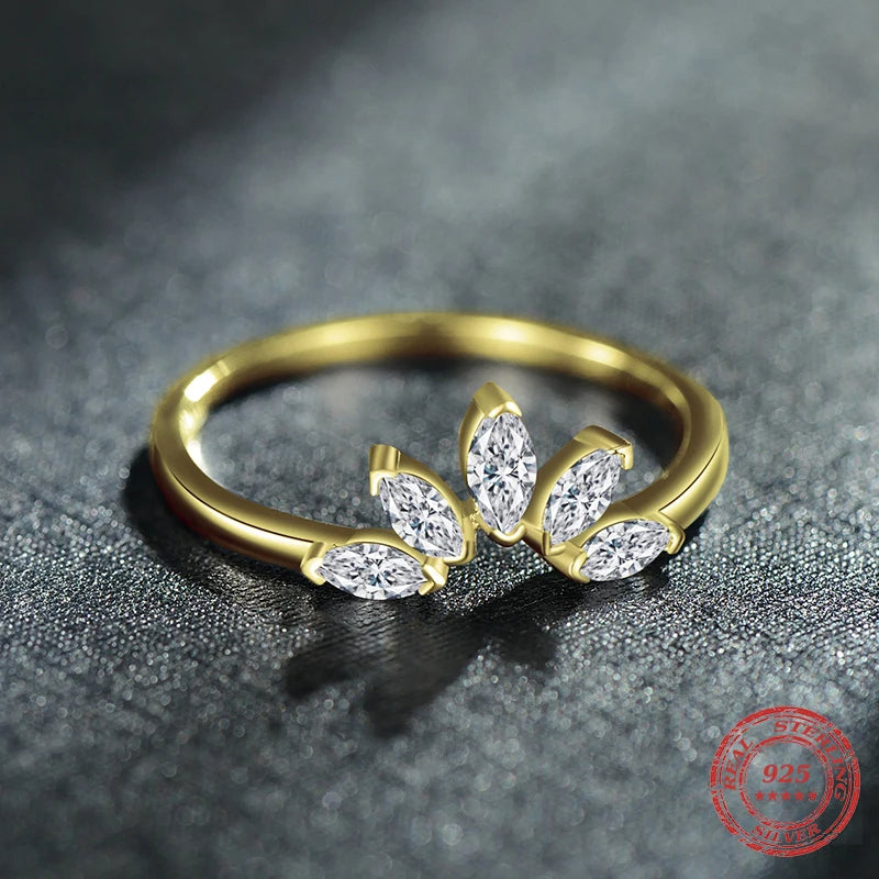 Modern silver ring with cz accents complementing a classic gold ring touch