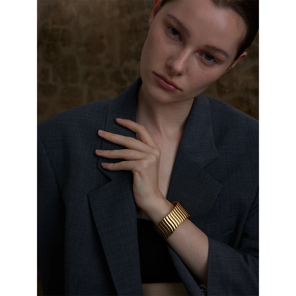 Minimal cuff bracelet highlighting gold bracelet gold glow