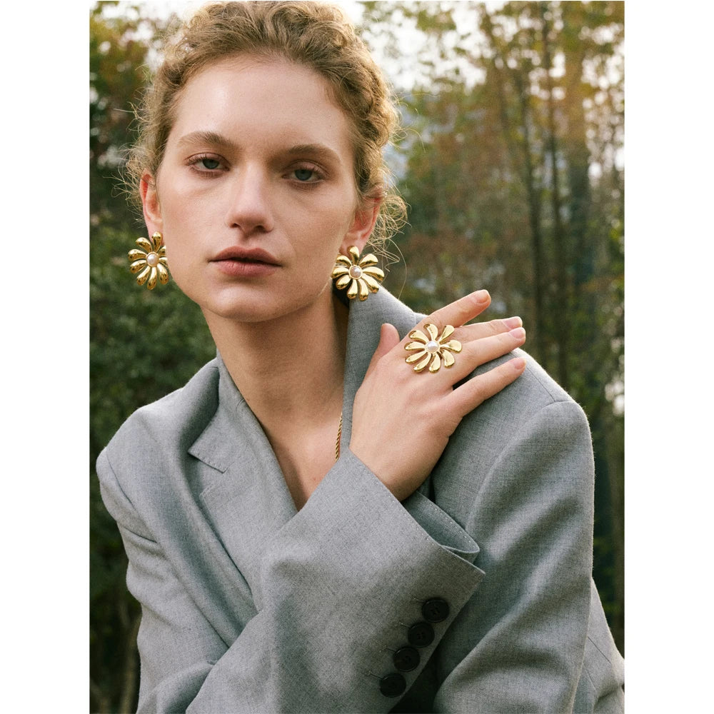 Necklace with gold finish styled as a flower necklace and earrings earrings gold set