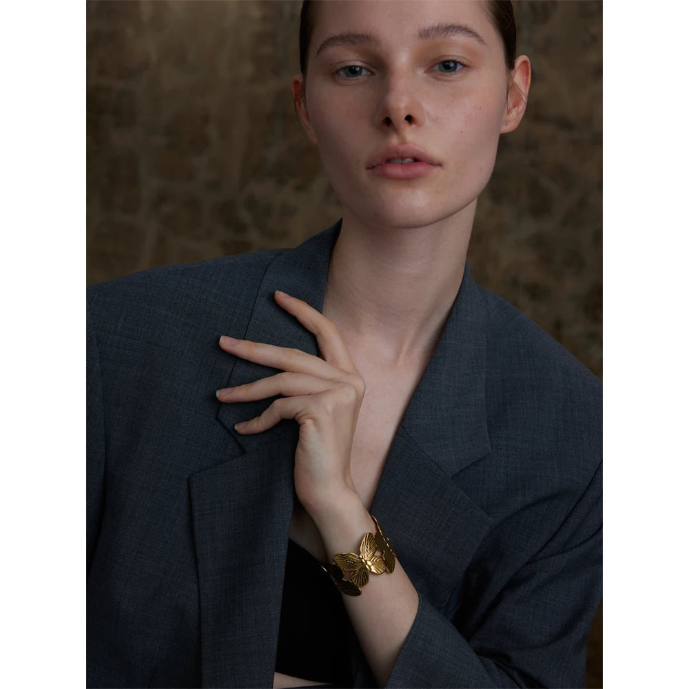 Bold butterfly cut-out stainless steel wide cuff accessory