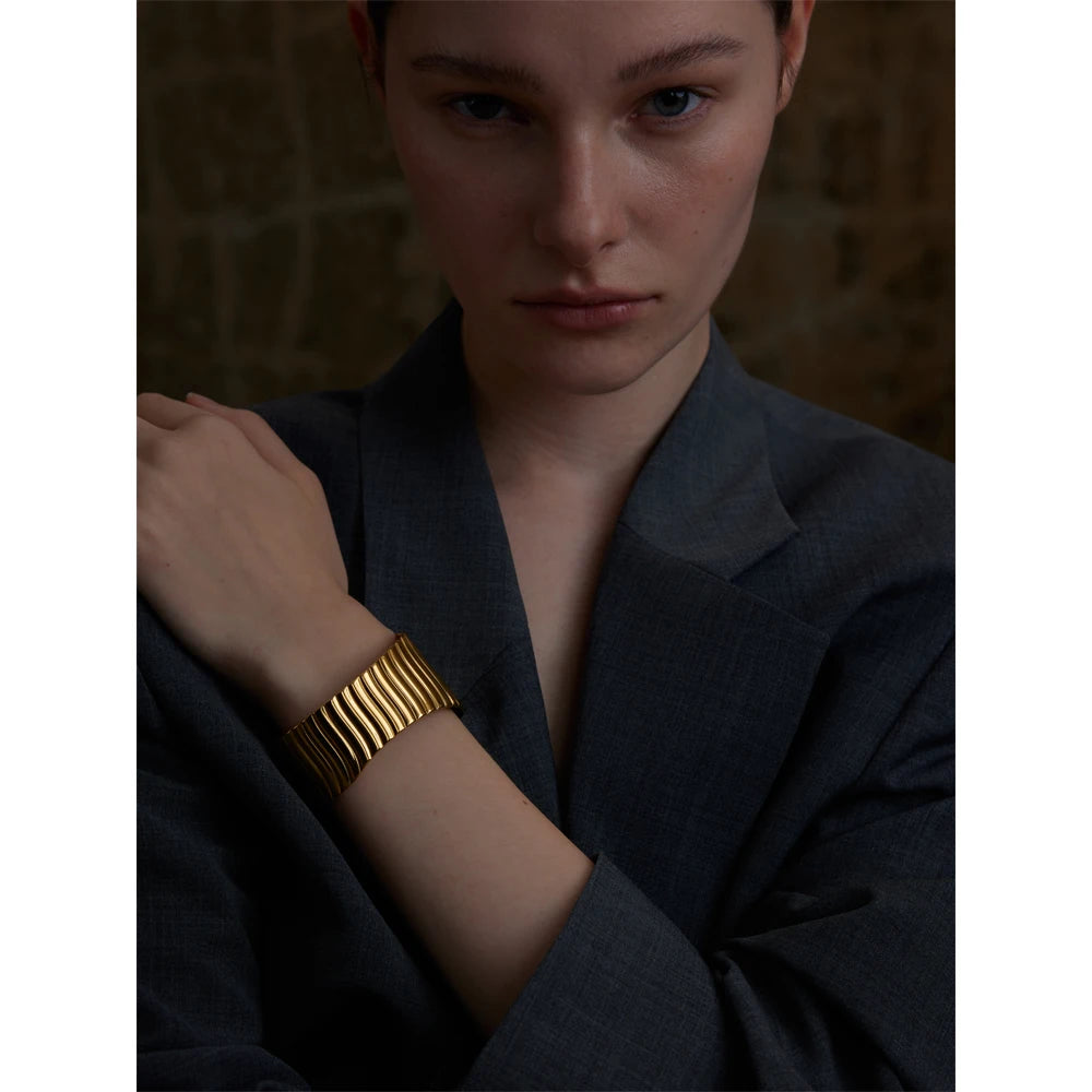 Sleek bangle bracelet captured as a gold bracelet bracelet favorite