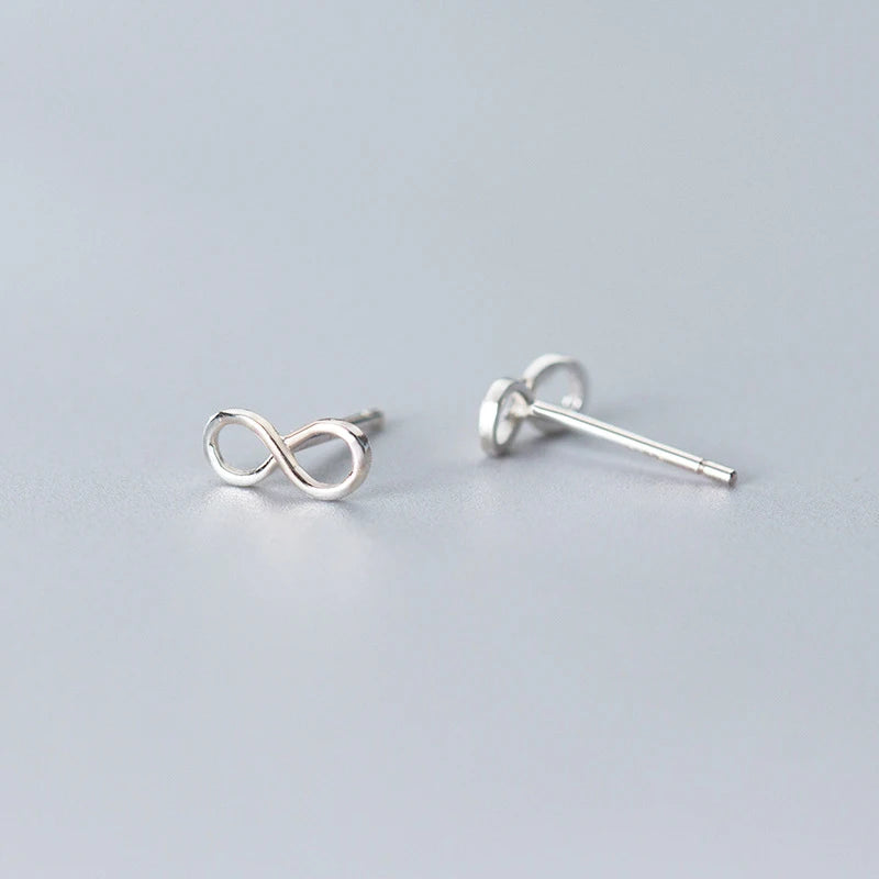 Stud earrings with rose gold accent and elegant silver color