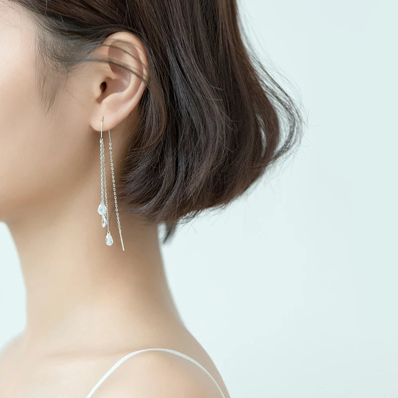 Close view of earrings silver sterling showing earrings with silver shine