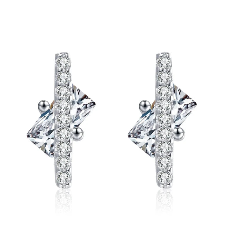 CZ stud earrings in silver color with a clean modern profile