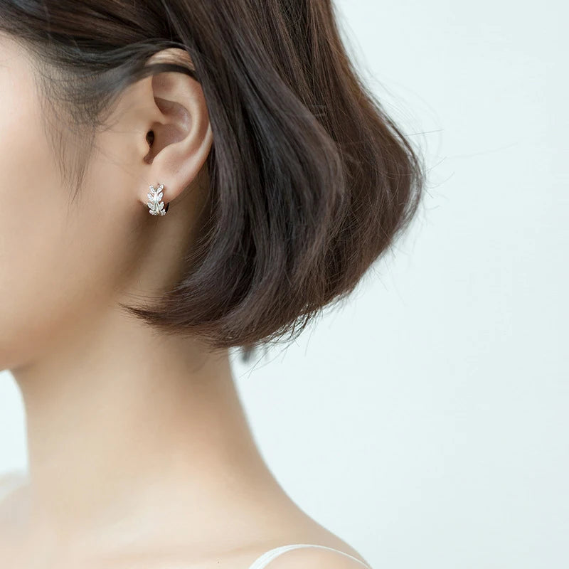 Earring earrings look featuring Zircon on sleek hoop earrings