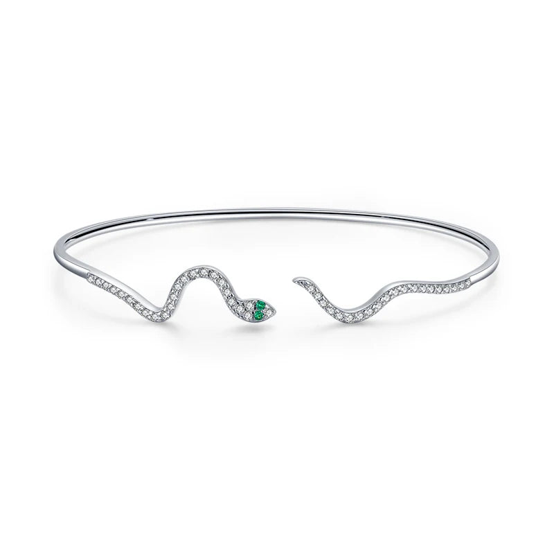 Elegant zirconia bangle paired with a polished silver bracelet design