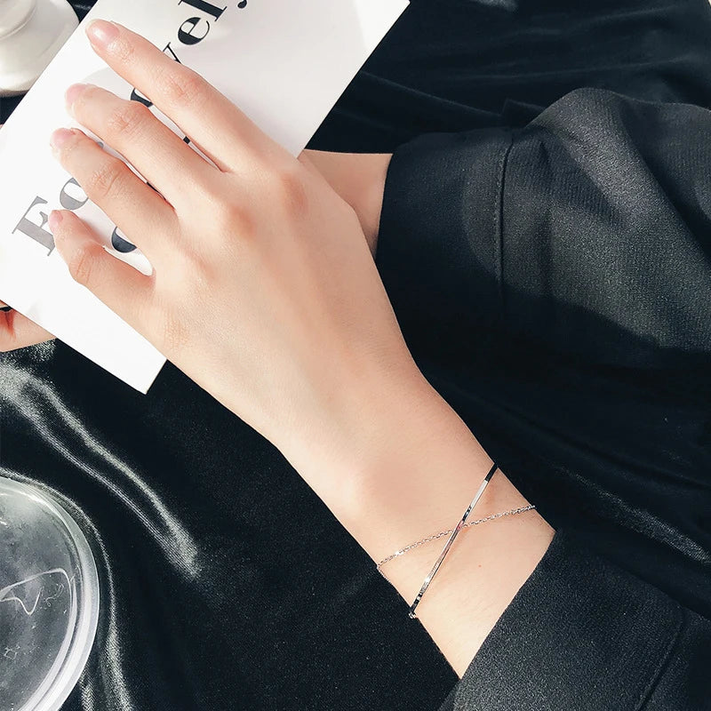 Sterling silver bracelet showing a clean silver bangle profile