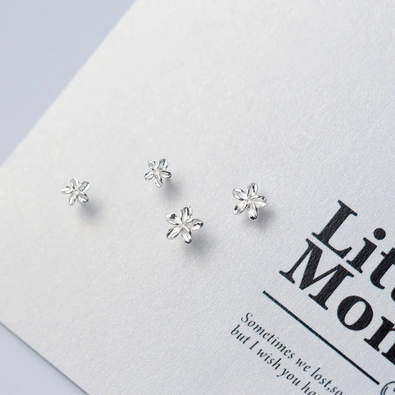 Silver stud earrings close up showing sterling silver earrings shine